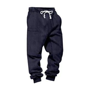 Detailed view of navy blue heavyweight jacquard joggers with white drawstring waist