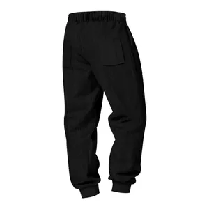 Macro view of black heavyweight jacquard joggers featuring a unique cable-knit texture.