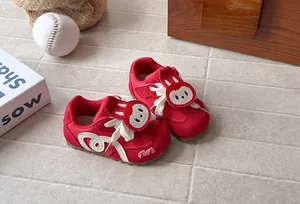 Red toddler sport shoes featuring a cute cartoon rabbit detail and flexible soft sole