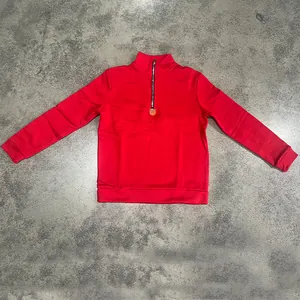 Detailed view of red heavy fleece men's sweatshirt with half-zip stand collar