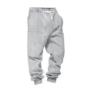 Detail view of light gray cable-knit jacquard fabric on men's heavy weight casual joggers.