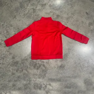 Detailed back view of a vibrant red men's stand-collar fleece zip-up casual sweatshirt