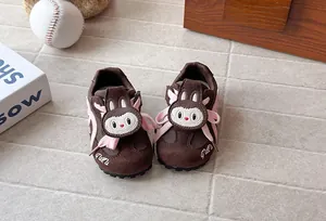 Detailed view of brown cartoon rabbit sneakers for toddlers with durable soft soles