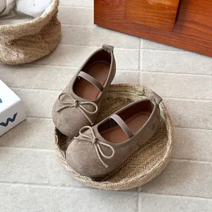 Classic brown suede Mary Jane flats for girls with bow detail and soft sole