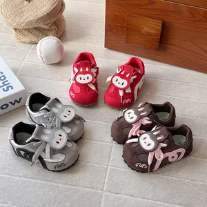Kids cartoon rabbit sneakers with soft soles, available in red, grey, and brown colors.