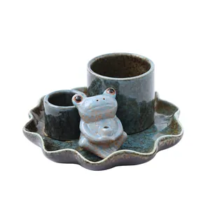 Handcrafted ceramic frog and lotus leaf incense holder for sage and Palo Santo wood