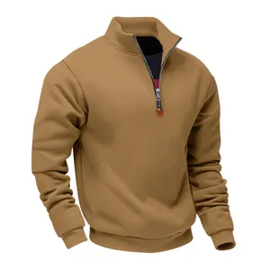 Detailed view of men's heavy fleece khaki sweatshirt with a stylish 1/4 zip stand collar.