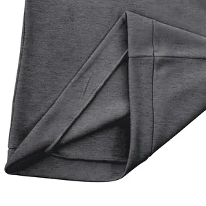 Macro view of the high-quality grey fleece fabric and neat stitching on men's sweatshirt