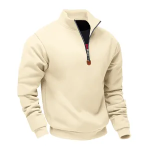 Detailed view of men's cream heavy fleece sweatshirt with 1/4 zip and stand collar