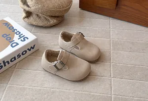 Cozy fleece-lined retro toddler shoes with adjustable buckle and soft rubber sole
