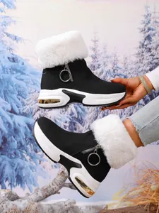 Women's platform snow boots featuring white faux fur lining and stylish ring zipper