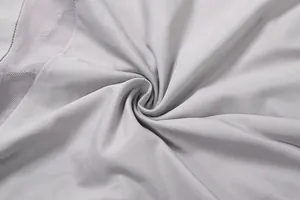 Primer plano de la textura de la tela gris con costuras de malla en mono sexy