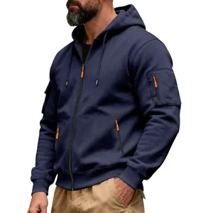 Close-up of navy heavy fleece hoodie with orange zipper accents and sleeve pockets