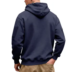 Rear view of a navy blue heavyweight fleece hoodie showing fabric texture and pocket