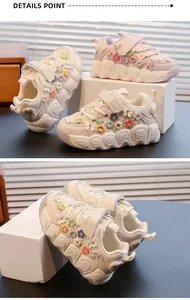 Detail view of girls floral chunky sneakers with soft soles and butterfly accents.