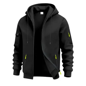 Detailed macro view of black heavy fleece zip-up hoodie featuring neon green zipper pulls