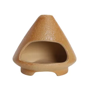 Handcrafted ceramic incense burner for Palo Santo and sage, fireplace-inspired design.