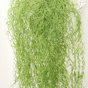 Detailed macro view showing the natural texture of hanging artificial green air grass plant