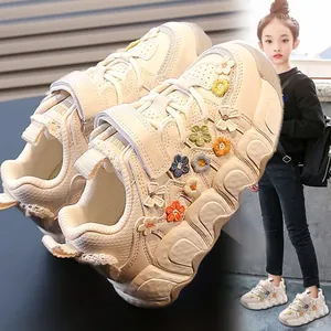 Girls' white sneakers with colorful floral accents and soft sole, casual sporty style