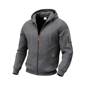 Detailed view of heavy fleece zip-up hoodie with orange accents and utility pocket