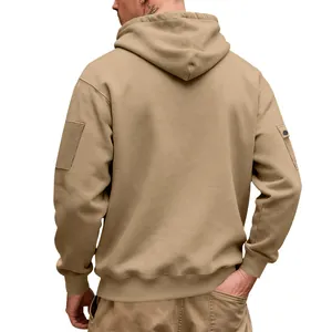 Back view of a khaki heavyweight fleece hoodie showing cargo arm pocket details