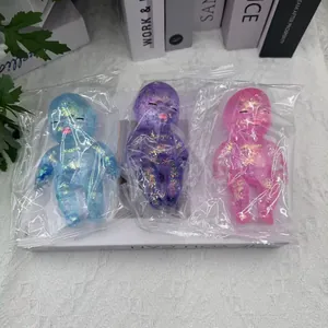 Lot de trois jouets squishy bébé translucides colorés avec des paillettes à l'intérieur