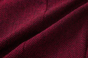 Nahaufnahme von rot-schwarzem Fischgrät-Textilstoff für elegante Herren-Vintage-Westen