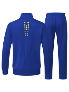 Detailed rear view of a blue men's sports tracksuit with yellow geometric accents