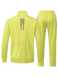 Back view of lime green men's tracksuit jacket and pants with black pattern