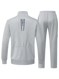 Back view of gray men's two-piece sports tracksuit with geometric pattern details