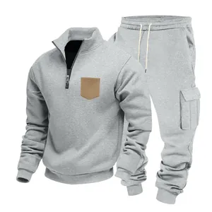 Men's heavy fleece grey cargo tracksuit set with quarter-zip stand collar.