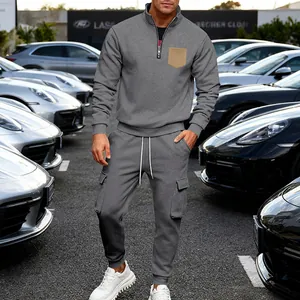 Grey heavyweight fleece tracksuit set with quarter-zip sweatshirt and cargo pants