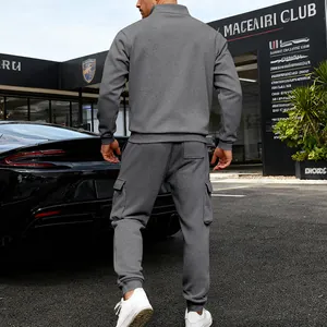 Rear view of men's grey heavy fleece tracksuit with cargo pockets and stand collar.