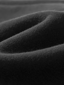 Macro view showing the breathable black knitted fabric texture of this casual hoodie