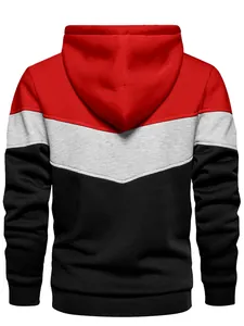 Detailed back view of a tri-color blocked hooded sweatshirt in red, grey, and black