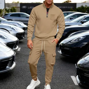 Men's heavy fleece tracksuit set featuring quarter-zip sweatshirt and cargo joggers.