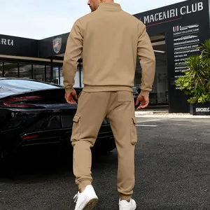 Rear view of a man wearing a khaki heavyweight fleece cargo sweatshirt and pants set