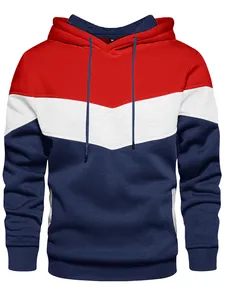 Detail view of color-blocked hoodie with red, white, and navy chevron pattern.