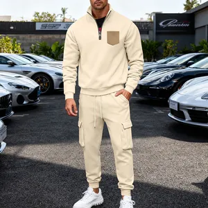 Detailed view of beige heavyweight fleece tracksuit with cargo pockets and stand collar.