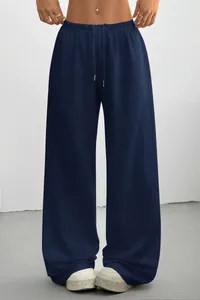 Detail view of navy blue high-waisted wide-leg sweatpants with drawstring waist