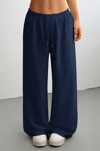 Close-up detail of navy blue wide-leg casual lounge pants featuring a drawstring waist