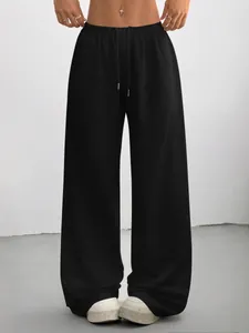 Women's casual black wide-leg trousers featuring a comfortable drawstring elastic waist