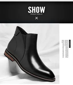 Detail view of men's black leather Chelsea boot with a sleek pointed toe and low heel.