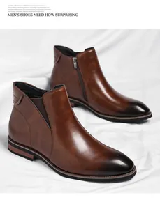 Detail view of brown leather Chelsea boots with zipper and elastic panel side
