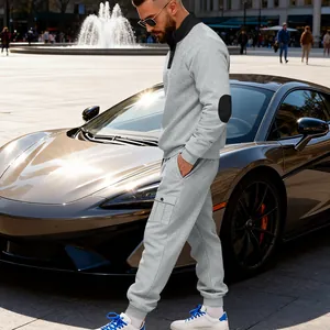 Side view of men's grey fleece-lined tracksuit with cargo pockets and elbow patches