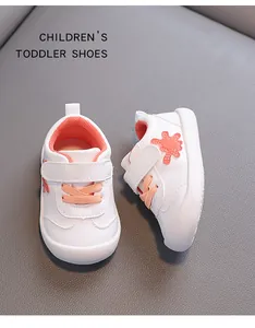 Breathable toddler walking shoes with soft soles and starry accents in white and peach