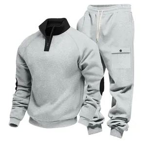 Men's grey heavyweight fleece-lined tracksuit with half-zip sweatshirt and cargo pants.