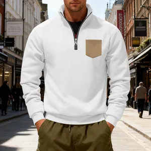 Detail of men's white heavyweight fleece sweatshirt with khaki chest pocket and zipper