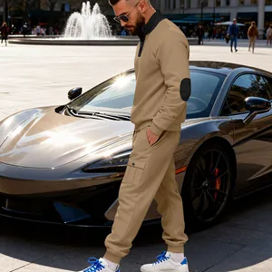 Side view of man in khaki mock neck sweatshirt and cargo joggers near luxury car.