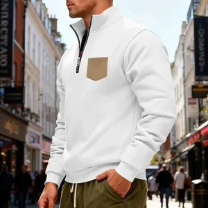 Side view of a white heavy fleece sweatshirt with a half-zip and khaki chest pocket